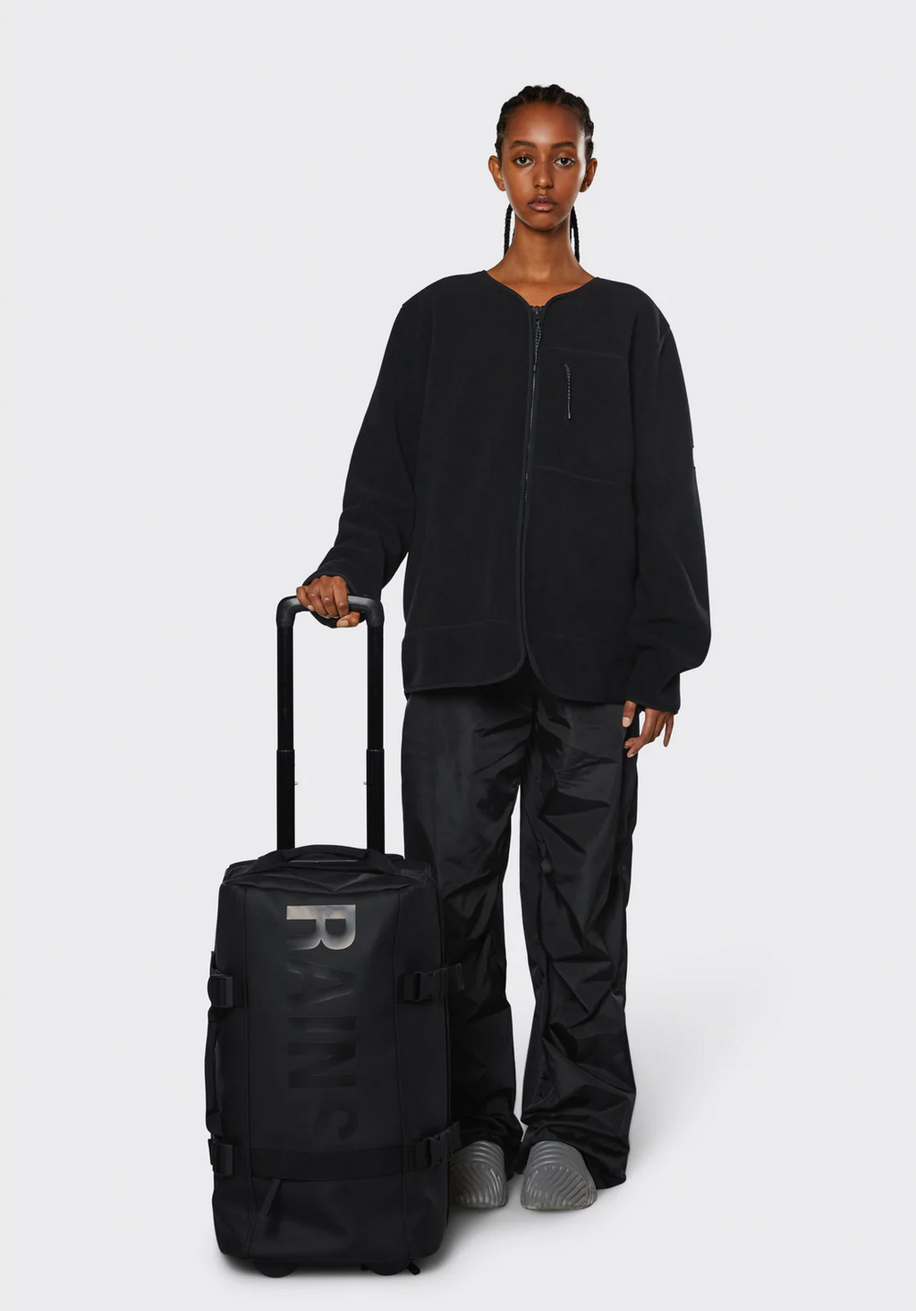 RAINS-SUIT-TRAVELBAG